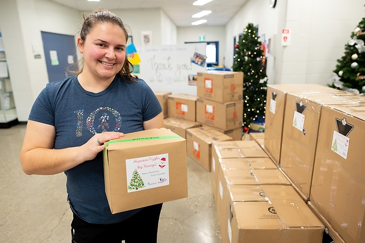 Community gathers to fill backpacks for Ukrainian students - Town ...