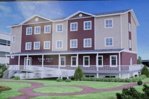 Rising Above breaks ground on new building - Town & Country News